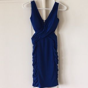 Blue bodycon dress with side cutouts
